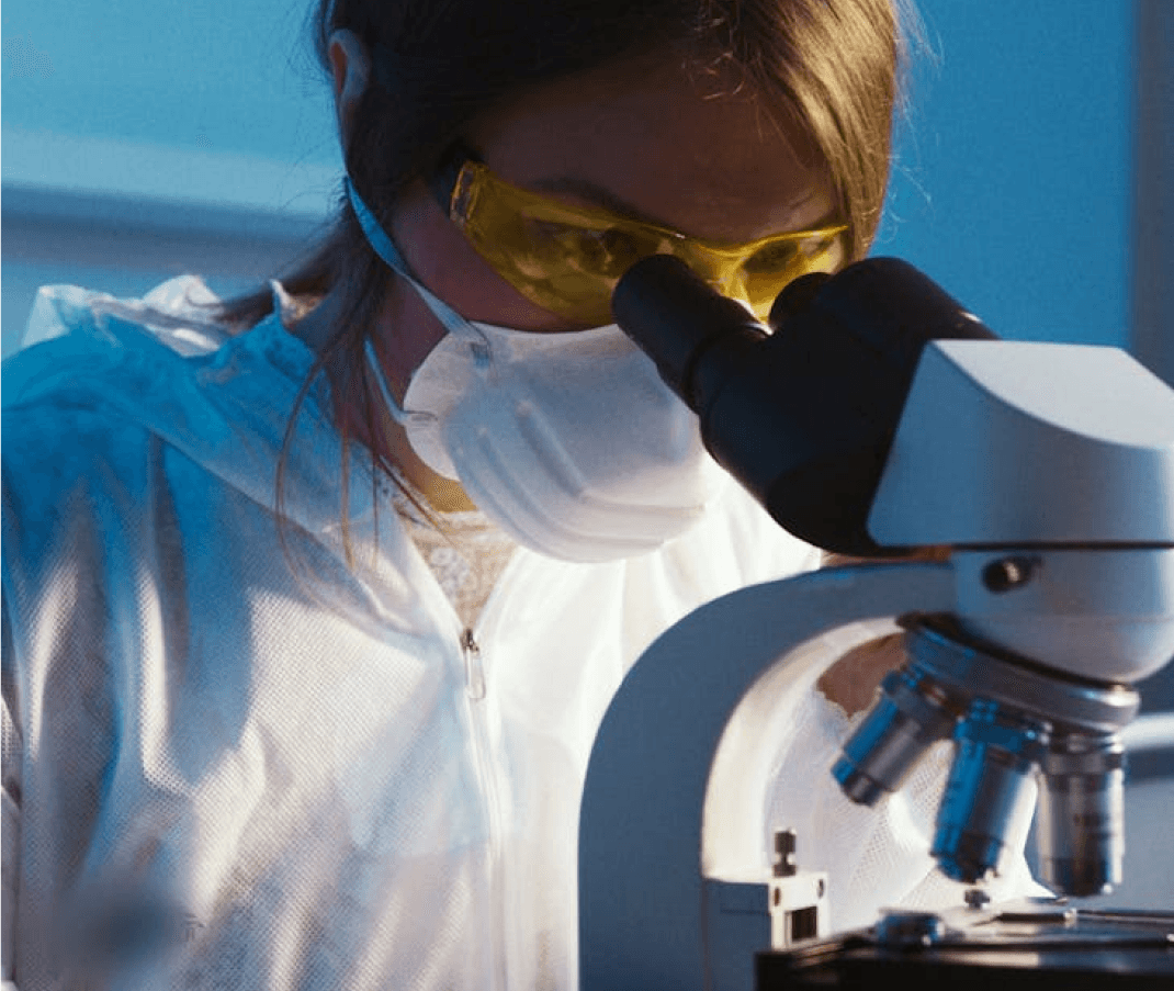 women working with microscope